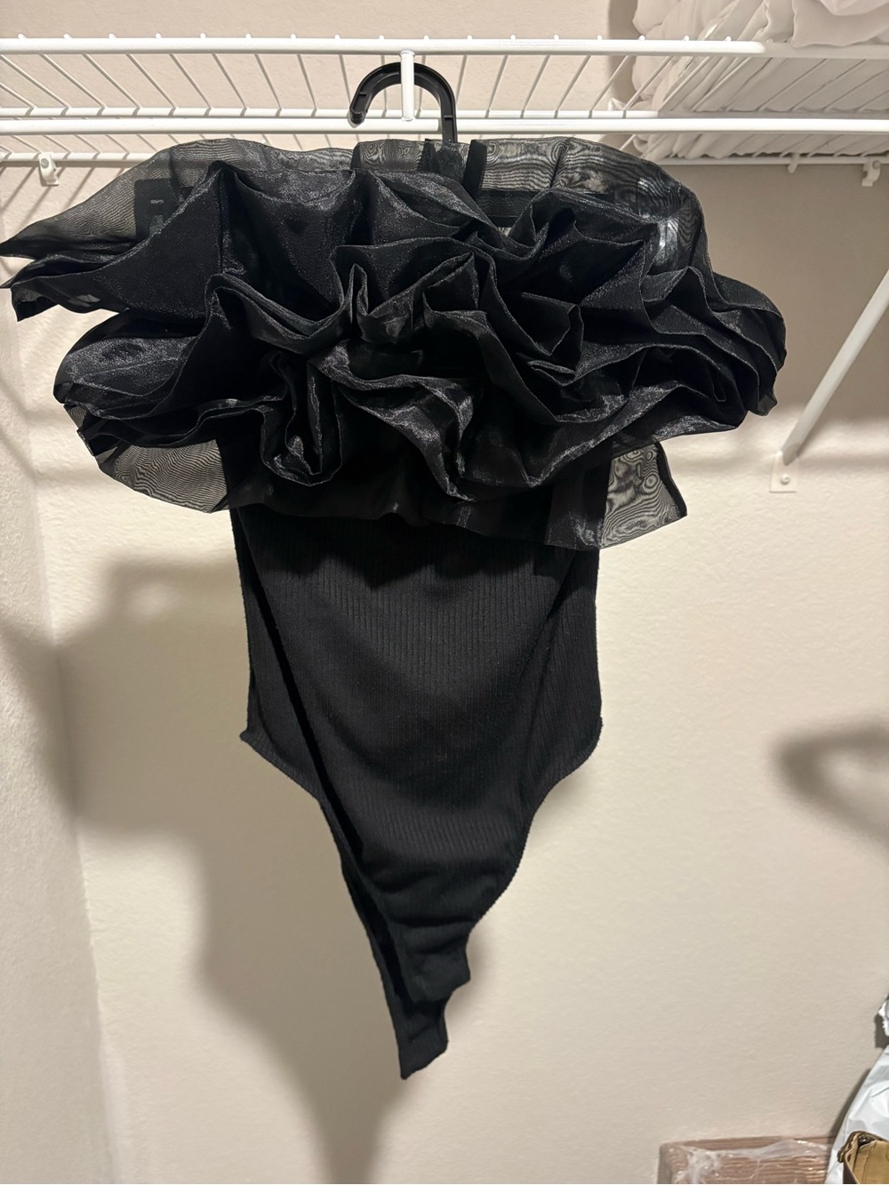 Discreet Black Off-Shoulder Ruffle Bodysuit